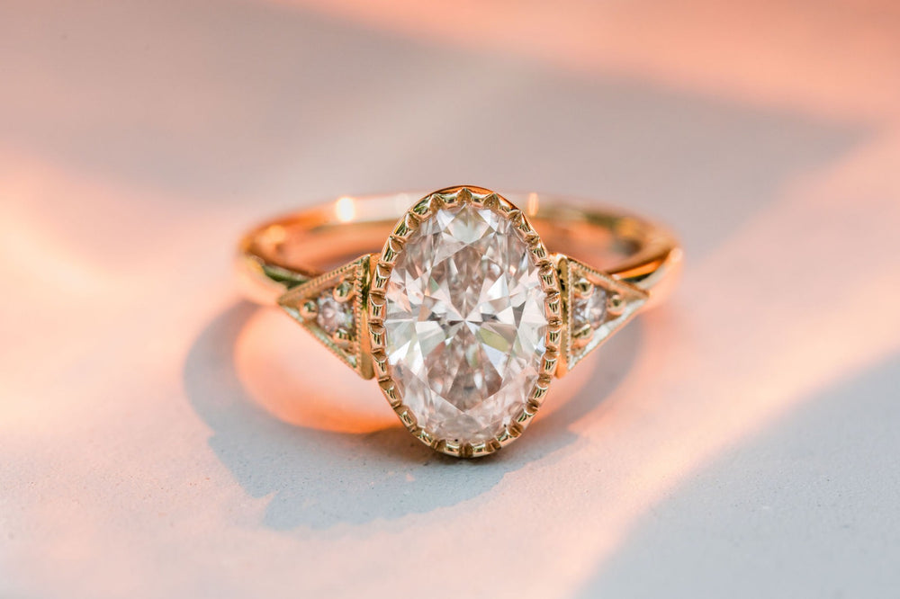 Yellow gold oval diamond ring