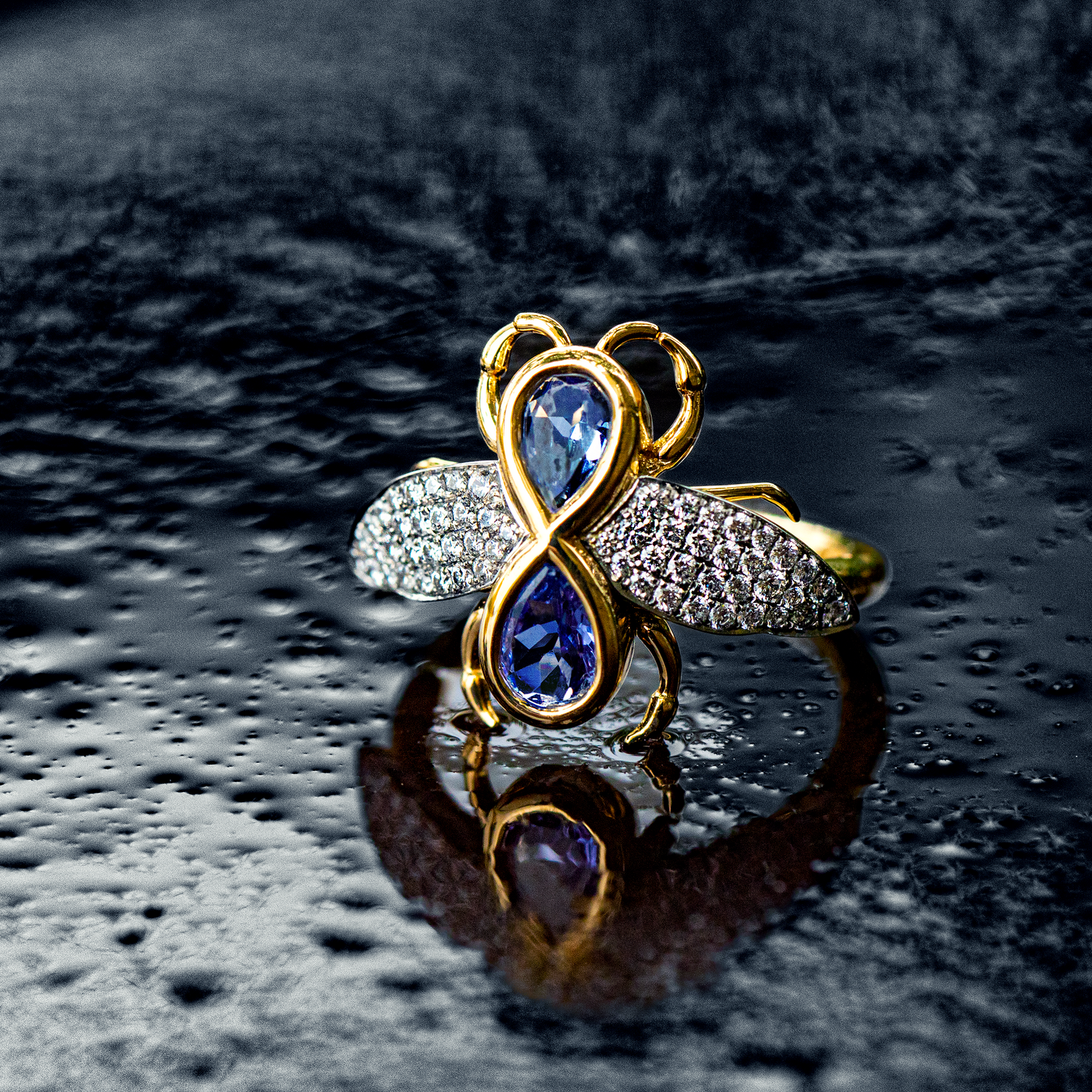 Insect right in 18k yellow and platinum with tanzanite and diamond accents