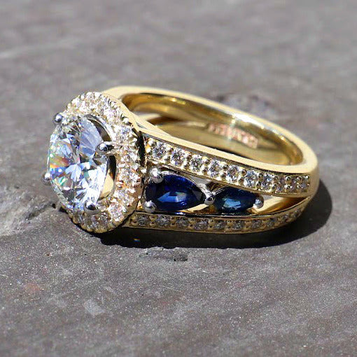 yellow gold ring with platinum accents, diamonds and sapphires