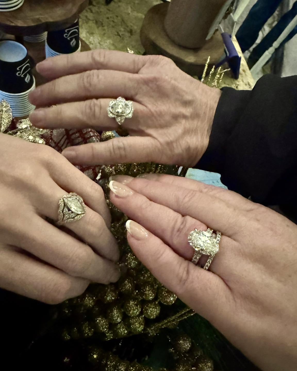 three women wearing their j fox custom rings