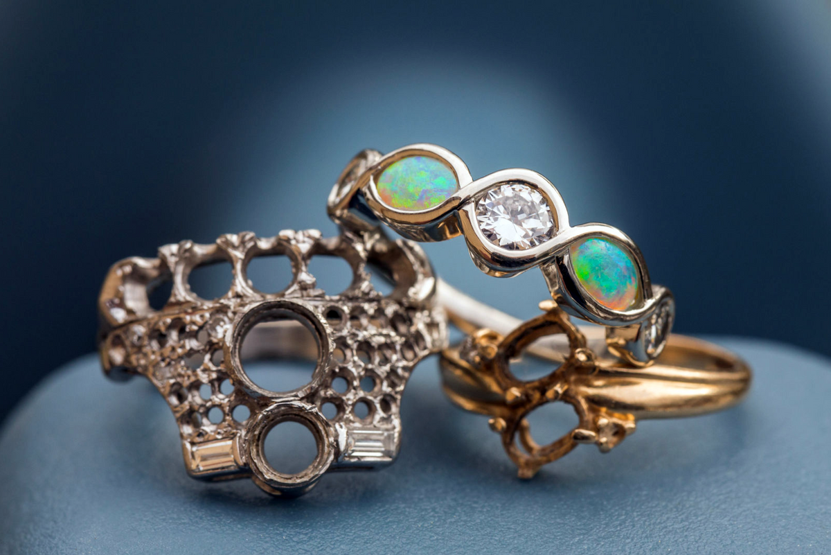 A brand new opal and diamond band made from pieces of old jewelry